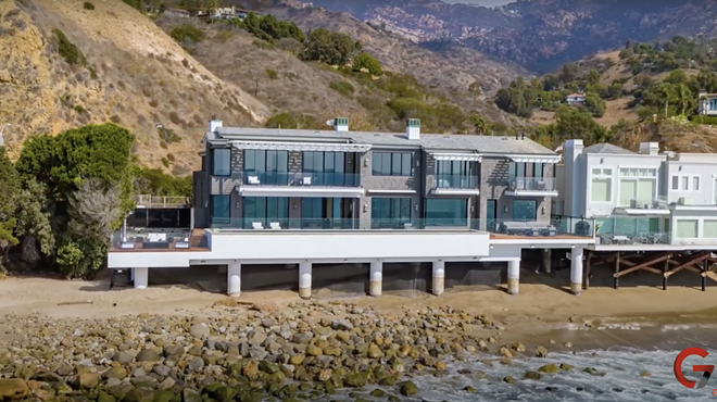 photo of a large beachfront mansion