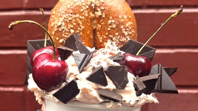 bagel and cream cheese in cup